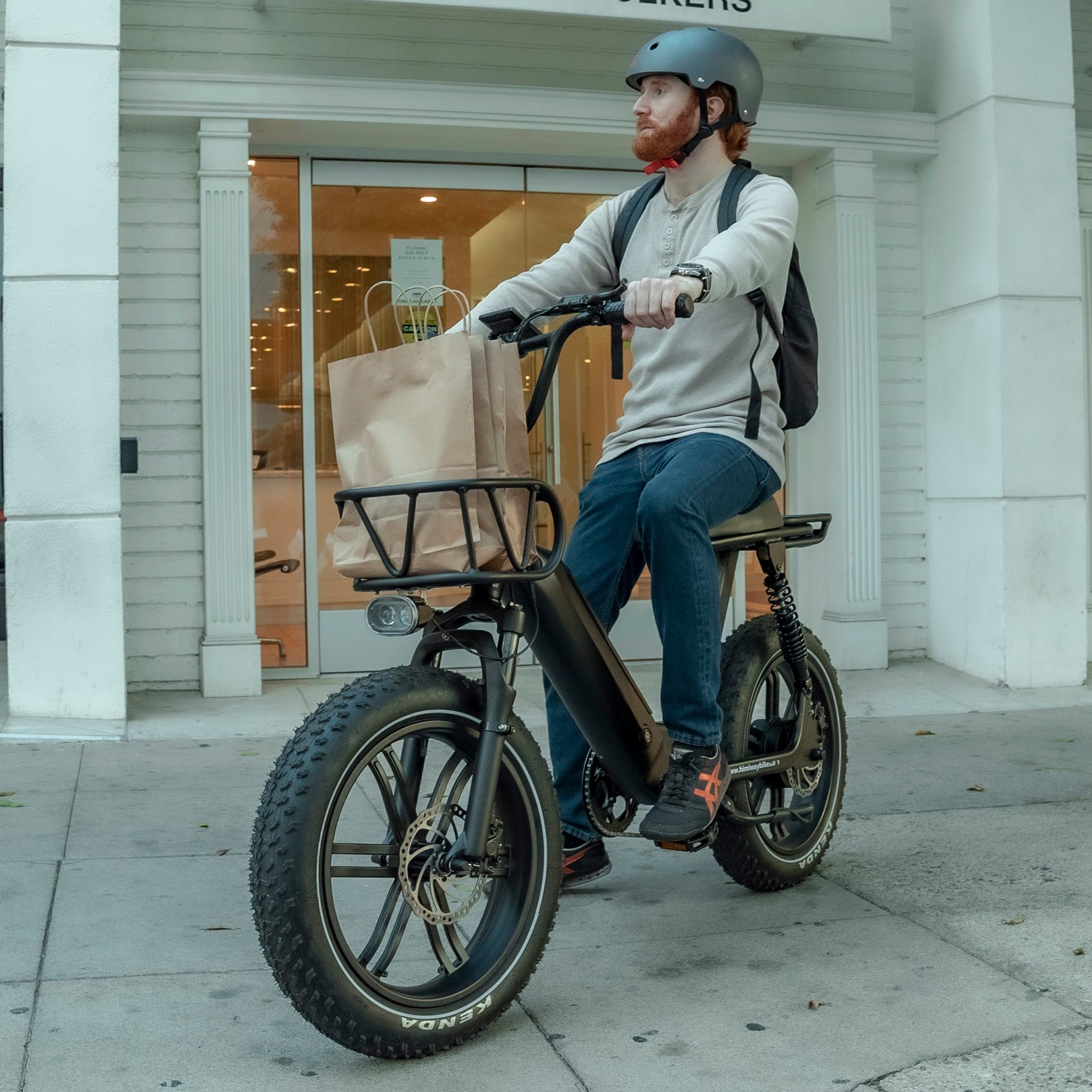 A man with Moped-Style Electric Bike