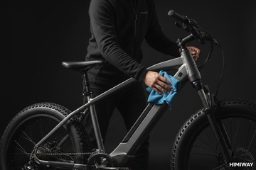 How do I clean my e-bike without damaging the electronics?